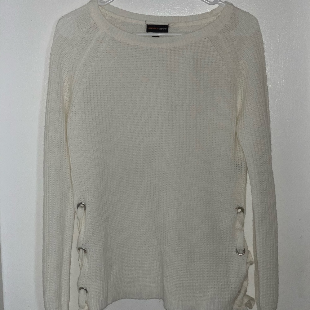 Knitted white sweater